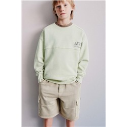 SUDADERA TEXTO BORDADO ETIQUETA