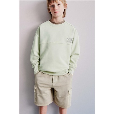 SUDADERA TEXTO BORDADO ETIQUETA