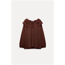 RUFFLED KNIT BLOUSE