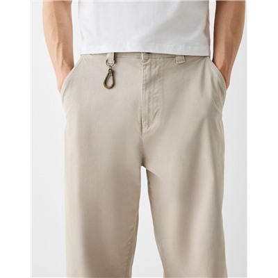 Skater-fit trousers with lobster clasp