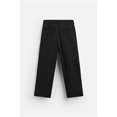 PANTALÓN RELAXED FIT PLIEGUES