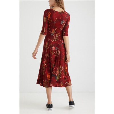 Vestido escotado vuelo
