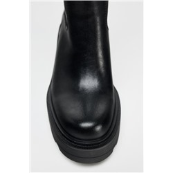 HEELED BOOTS WITH TRACK SOLES