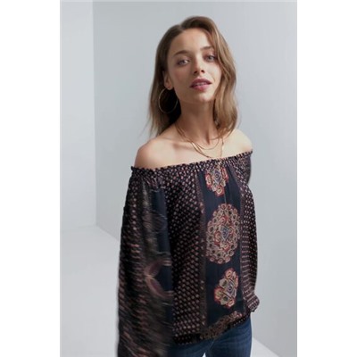 Blusa loose cuello barco