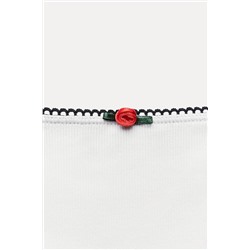 RIBBED STRAPPY TOP WITH FLOWER DETAIL