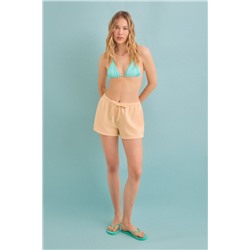 Pantalón corto felpa naranja