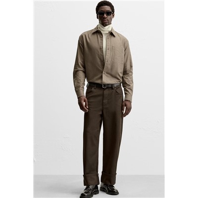 PANTALÓN BAJO CON VUELTA