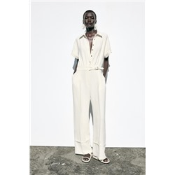 CREPE BUCKLE WAIST JUMPSUIT