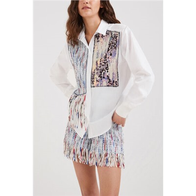 Camisa de patch y flecos