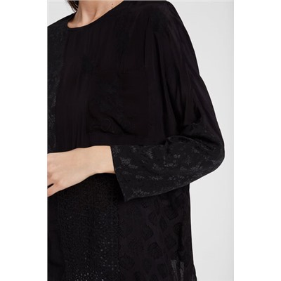 Blusa oversize transparencias