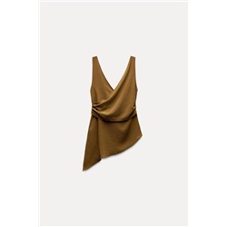 ASYMMETRIC FLOWING TOP