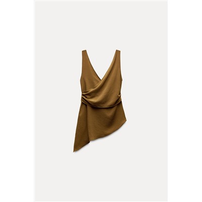 ASYMMETRIC FLOWING TOP