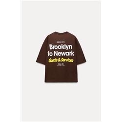 T-SHIRT WITH SLOGAN
