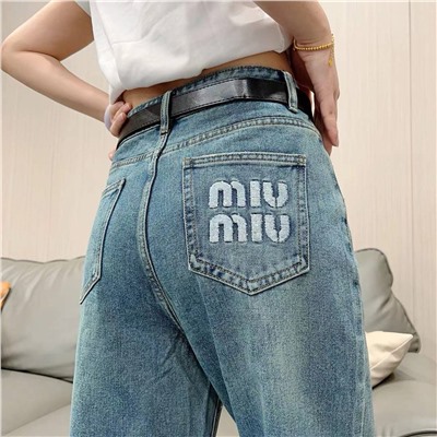 Джинсы со стразами  miumiu  Коллекция 2024