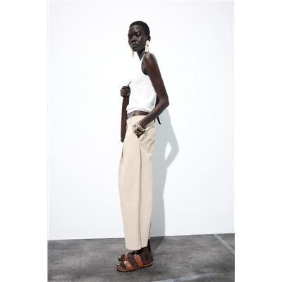 CHINO TROUSERS WITH DARTS