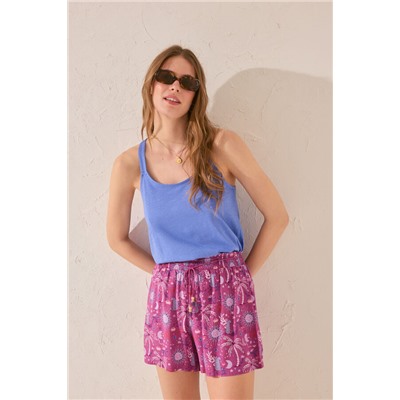 Pantalón corto estampado morado