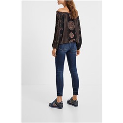 Blusa loose cuello barco