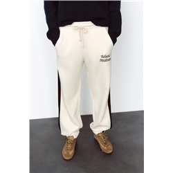JOGGING TROUSERS WITH SLOGAN