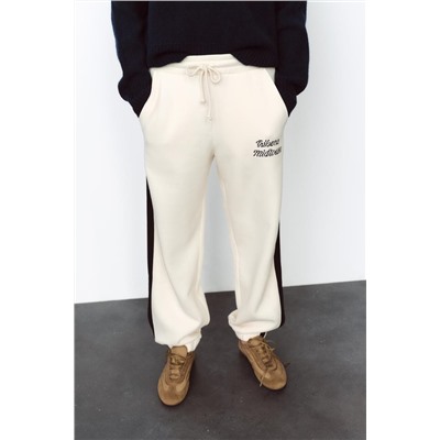 JOGGING TROUSERS WITH SLOGAN