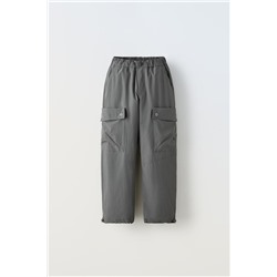 TECHNICAL TROUSERS WITH POCKETS
