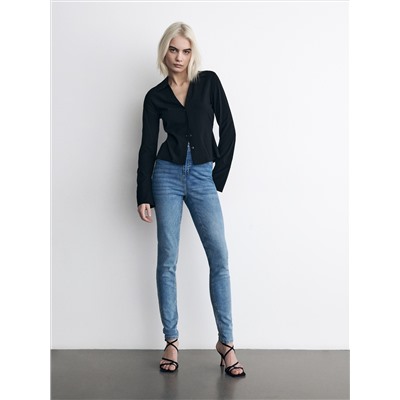 Slim-Jeans mit hoher Leibhöhe
