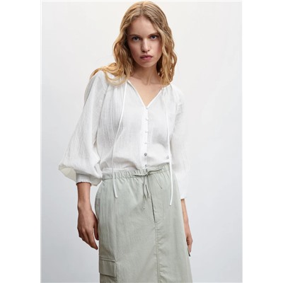 Blusa textura botones