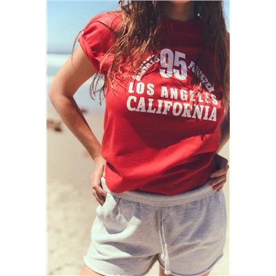 T-SHIRT WITH SLOGAN