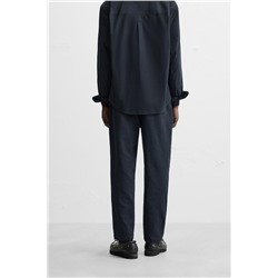 TEXTURED PLEATED TROUSERS