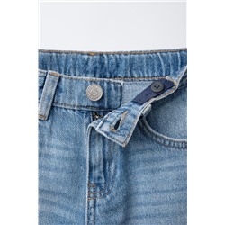 STANDARD RIPPED JEANS
