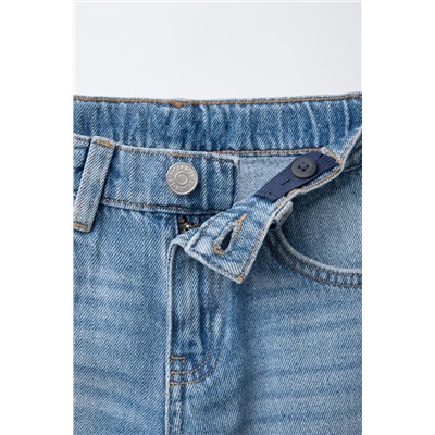 STANDARD RIPPED JEANS