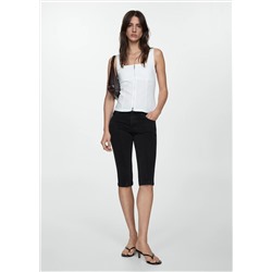 Jeans slim capri costuras decorativas