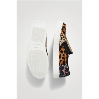 Sneakers slip on de piel