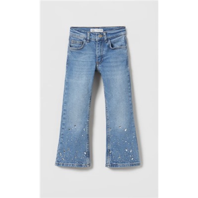 FLARED JEANS WITH RHINESTONES