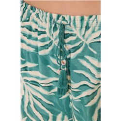 Pantalón largo estampado hojas verde