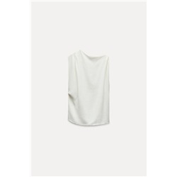 ASYMMETRIC RUSTIC TOP
