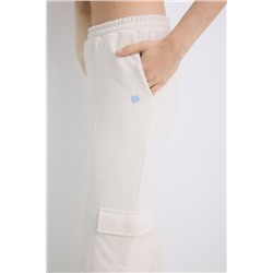 Pantalón largo flare felpa marfil