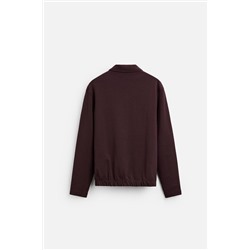 POLO INTERLOCK BOLSILLO