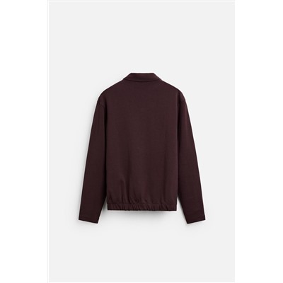 POLO INTERLOCK BOLSILLO