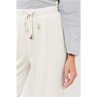 Pantalón 7/8 de pijama de terciopelo cintura alta - Crudo