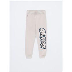 PRINTED TRACKSUIT BOTTOMS