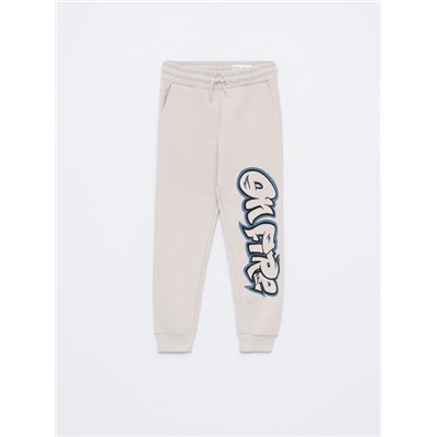 PRINTED TRACKSUIT BOTTOMS