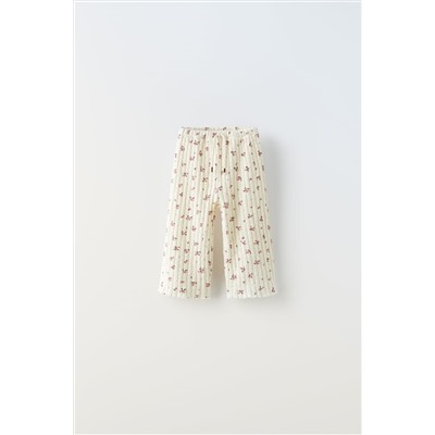 TEXTURED FLORAL PRINT TROUSERS