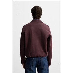 POLO INTERLOCK BOLSILLO