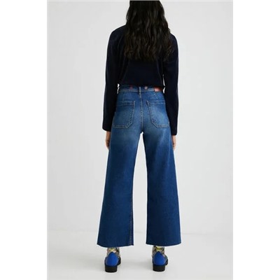 Pantalón vaquero tobillero pata ancha