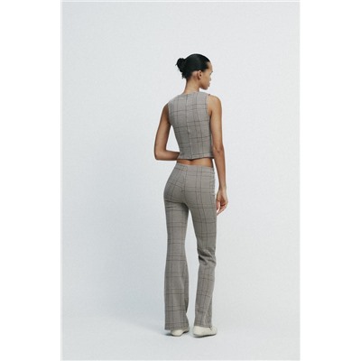 TOP CHALECO INTERLOCK