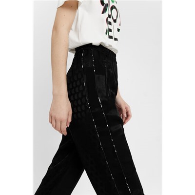 Pantalón en logomanía brillante