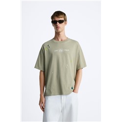 CAMISETA SALPICADURA TEXTOS