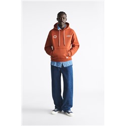 SUDADERA CAPUCHA GRÁFICOS JAMES COFFMAN