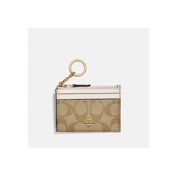 Mini Skinny Id Case In Signature Canvas