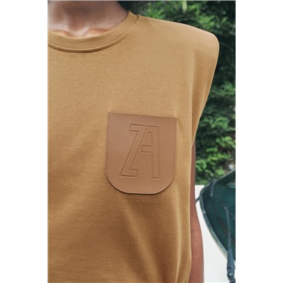 TOP WITH PADDED SHOULDERS AND LABEL